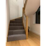 Timber staircase with chrome spindles